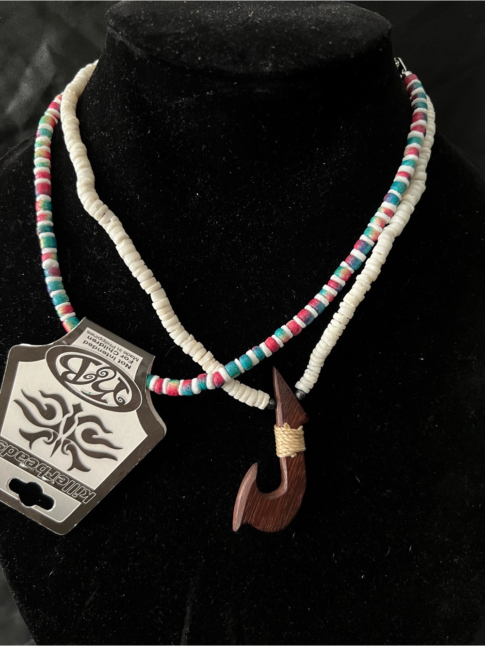 Handcrafted White Bead Necklace with Multicolor Accents and Wood Hook Pendant